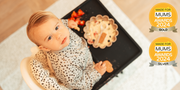 Baby mealtime accessories in soft neutrals for modern homes
