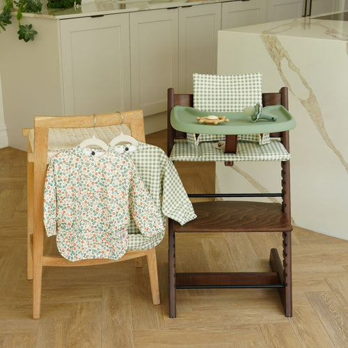 Stokke Tripp Trapp highchair styled with AZEbabydream cushion, placemat and matching long sleeve bibs