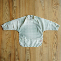 Sage gingham waterproof long sleeve bib for baby weaning and messy play