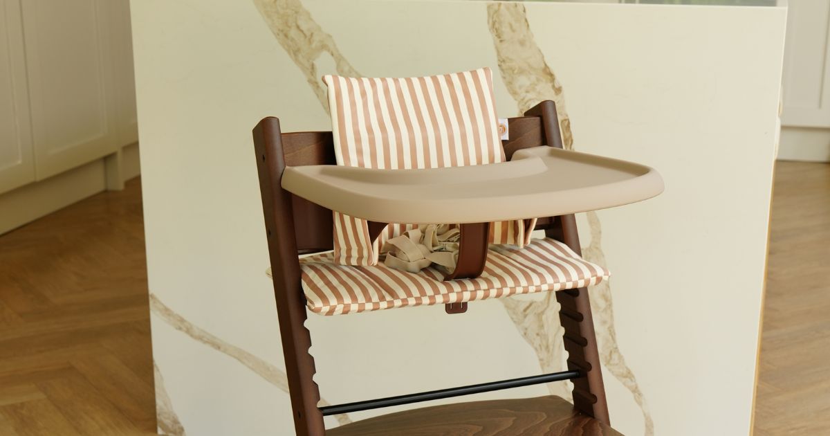 Wipe-clean Stokke Tripp Trapp cushion fitted to a wooden highchair
