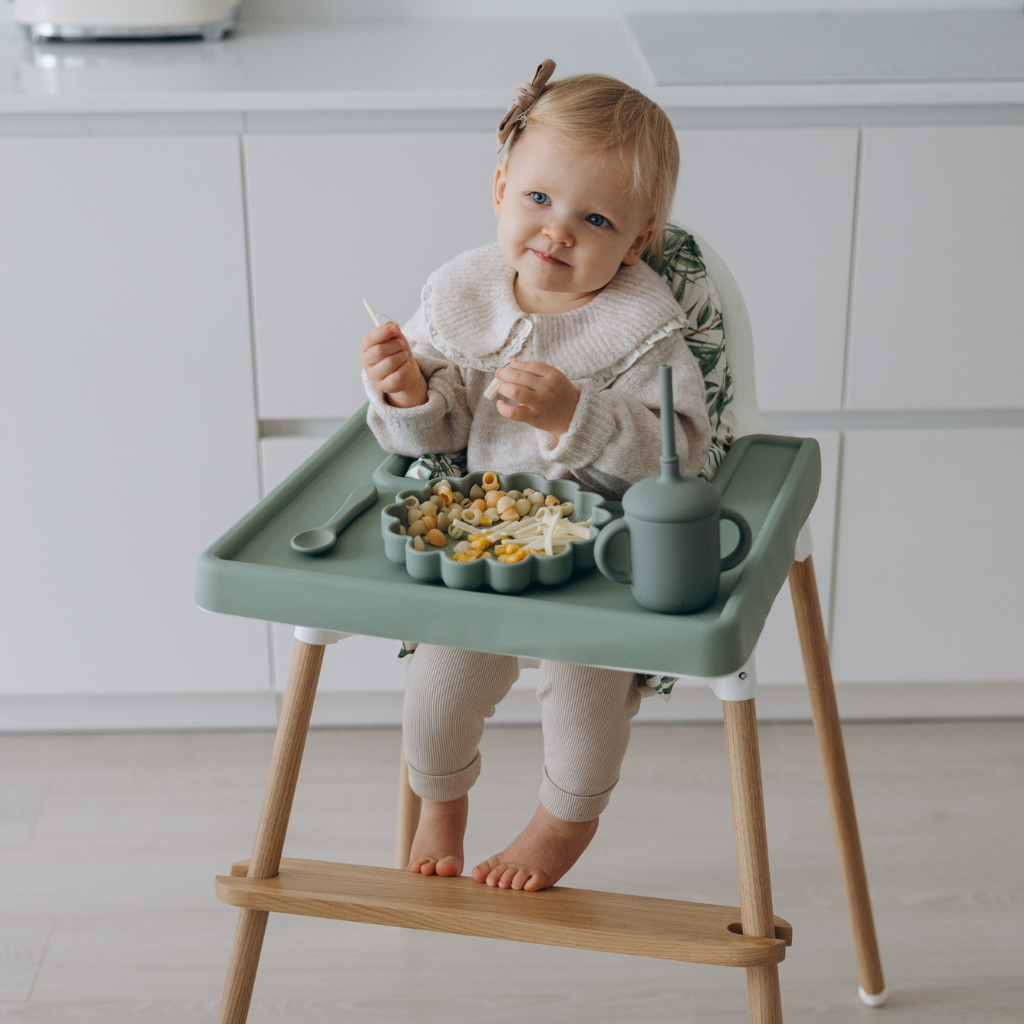 Full Cover Stokke Tripp Trapp Silicone chair and baby eating food