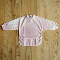 Peach Gingham long sleeve baby weaning bib with food-catching pocket
