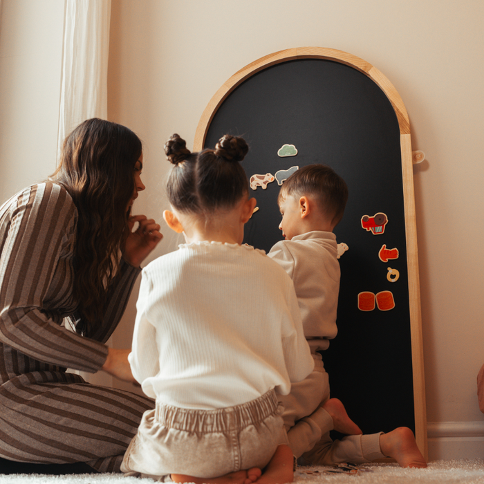 Kids playing with Black Magnetic chalkboard in arch shape wooden frame from ash wood by azebABYDREAm 