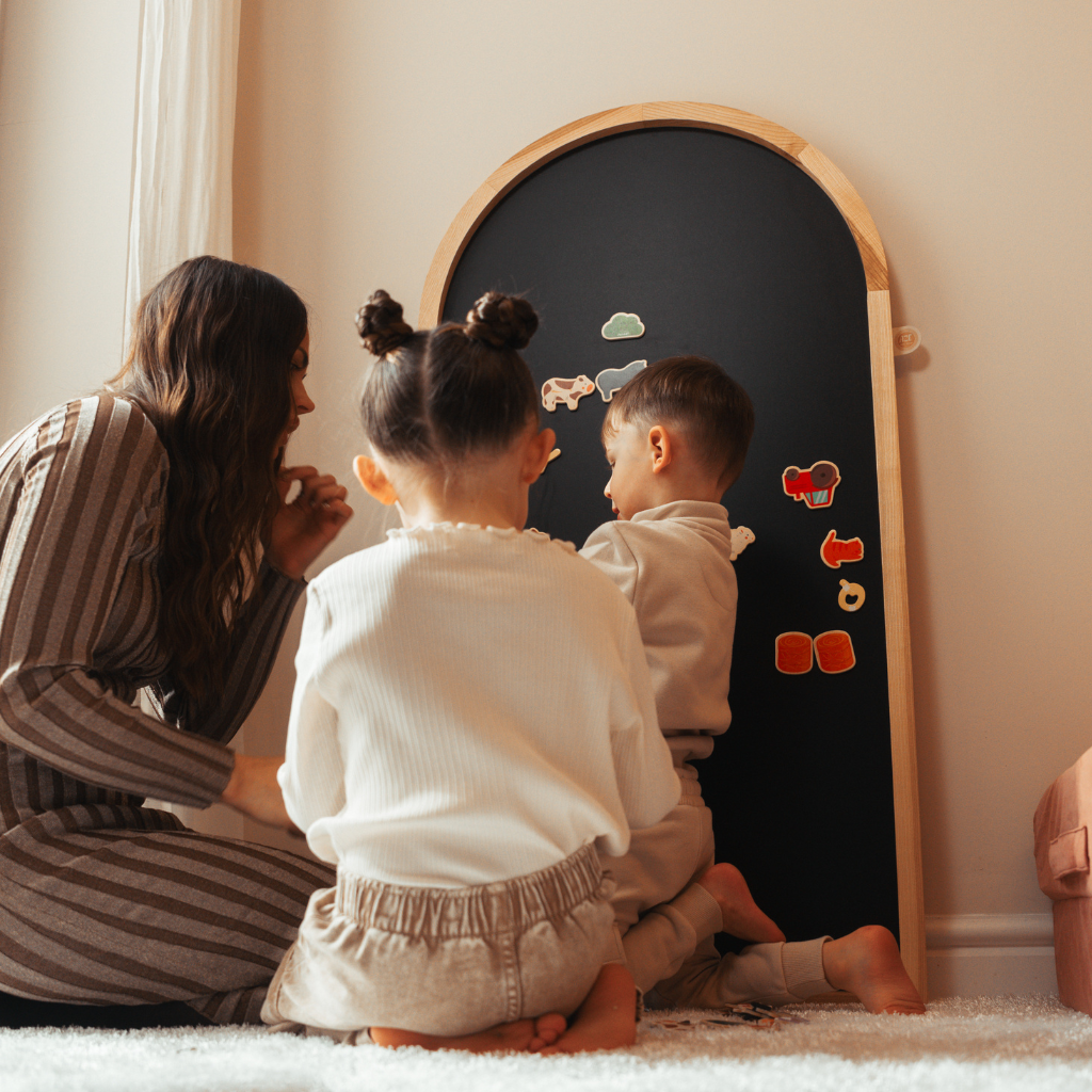 Kids playing with Black Magnetic chalkboard in arch shape wooden frame from ash wood by azebABYDREAm 