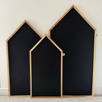 Close up of Pink Marshmallow magnetic chalkboard house wooden frame