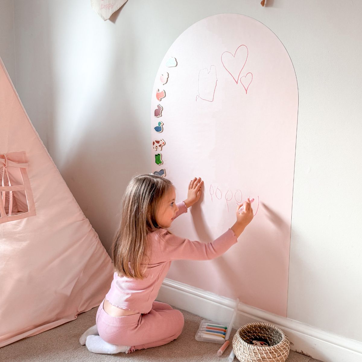 Child drawing on Arch Magnetic Chalkboard