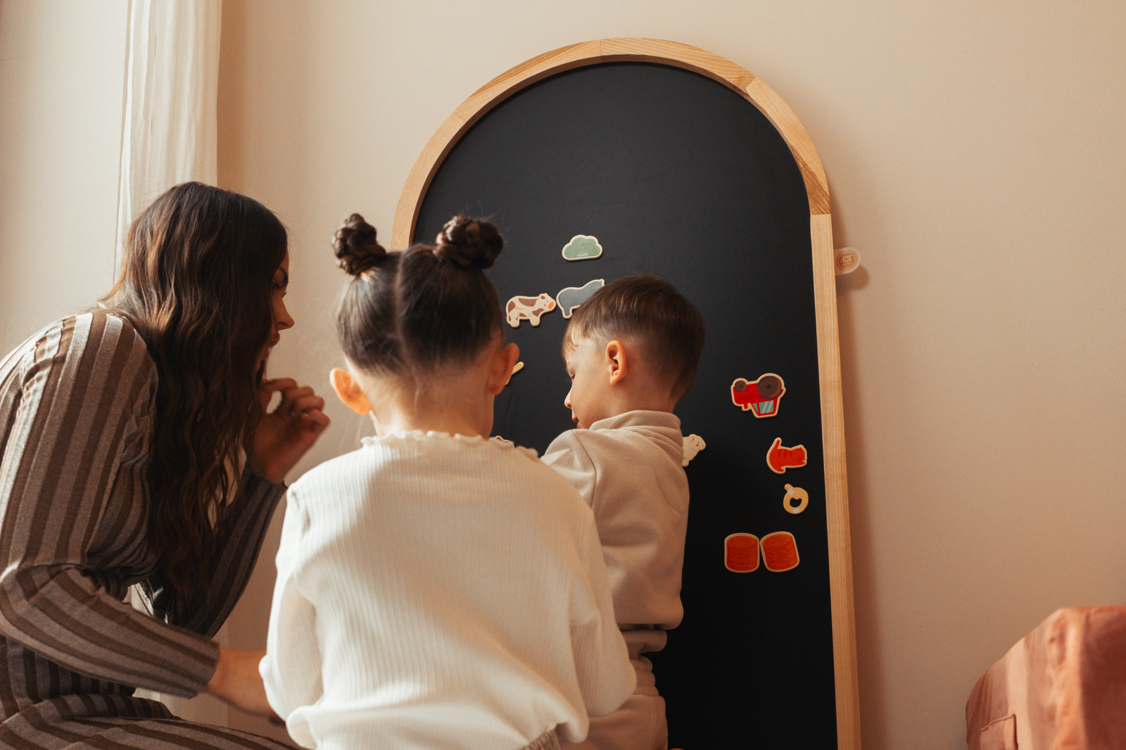 Kids playing with Black Magnetic chalkboard in arch shape wooden frame from ash wood by azebABYDREAm 